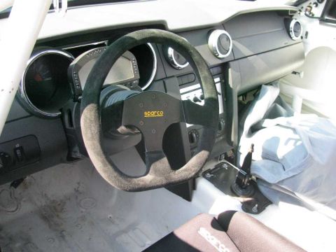 2003 Mercury Marauder - Custom racing interior of a 2005 Ford Mustang, a Sparco steering wheel and digital display.