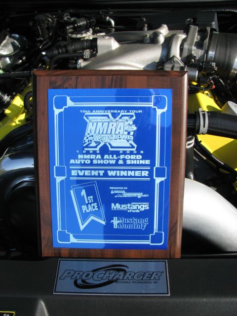 2003 Mercury Marauder - NMRA All-Ford Auto Show & Shine event winner plaque displayed in front of a vehicle's engine.