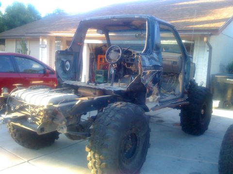 1994 Ford Bronco - This 1994 Ford Bronco is undergoing disassembly, showing its chassis and interior components.