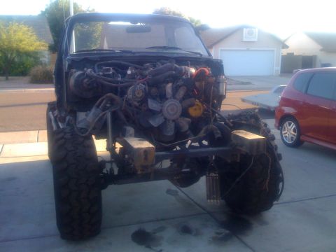 1994 Ford Bronco - This Ford Bronco is missing its front clip and body panels, revealing the engine and chassis.