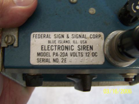 1998 Ford Crown Victoria - Close-up of a Federal Sign & Signal Corp. electronic siren, model PA-20A.