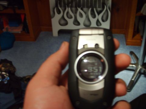 1995 Ford Bronco - A cell phone is held up, displaying a digital readout.