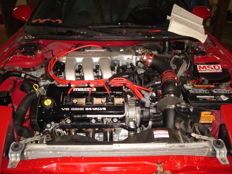 1993 Ford Probe - Engine bay view of a Mazda V6 DOHC 24-Valve engine, likely from a performance application.