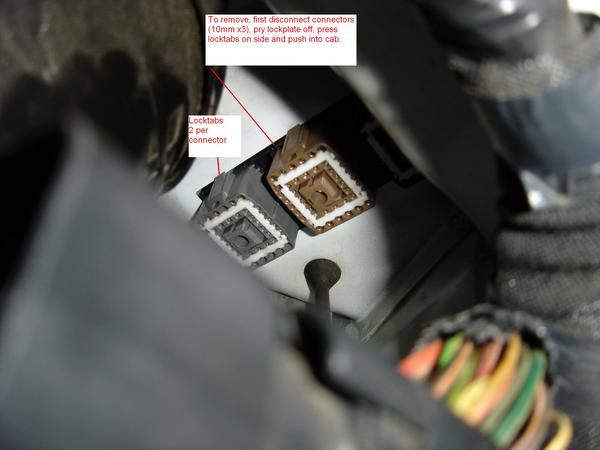 Close-up of electrical connectors with text instructions