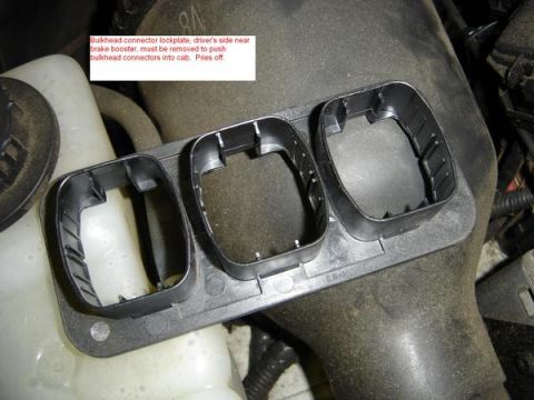 2007 Ford Mustang - Bulkhead connector lockplate, driver's side near brake booster, must be removed to push bulkhead connectors into cab.