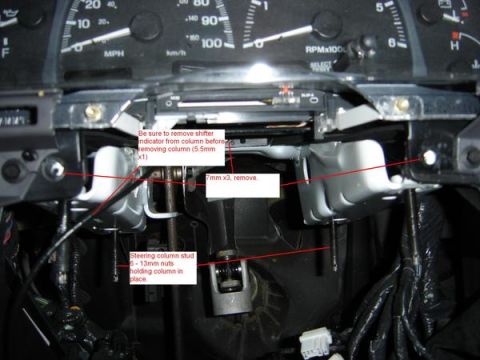 2007 Ford Mustang - This image shows the steering column assembly with instructions for removal, not a 2007 Ford Mustang.