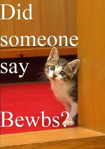 2000 Mercury Grand Marquis - A kitten peeks around a corner, with text overlay and a website logo at the bottom.