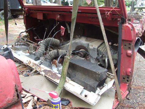 1967 Ford Bronco - Vehicle interior components disassembled, with heater core and ducting exposed.