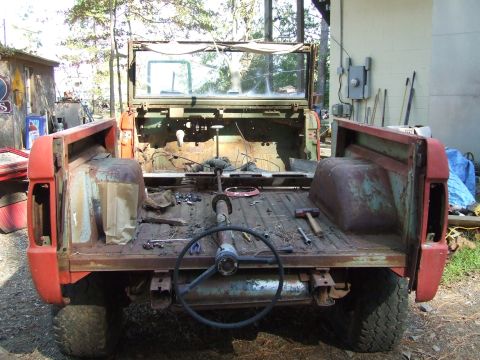 1967 Ford Bronco - This disassembled Ford Bronco is missing its tailgate and appears to be undergoing restoration or repair.