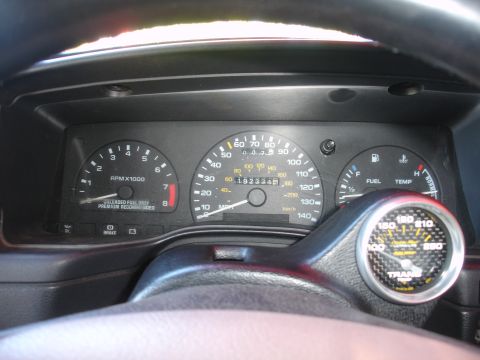 1993 Ford Taurus - The car's dashboard shows the odometer reading 192,334 miles and includes an aftermarket boost gauge.