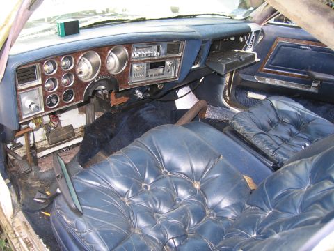 2001 Ford Crown Victoria - Photograph of a blue car interior, not a technical document.