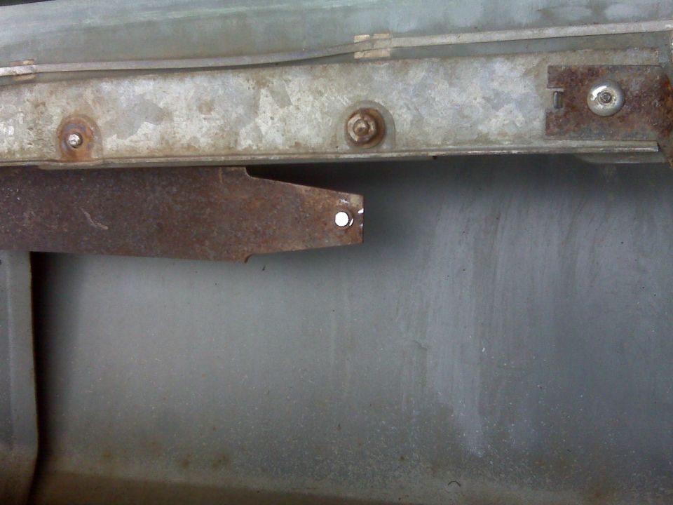 Successfully removing the top of the old roller in order to drill it out.