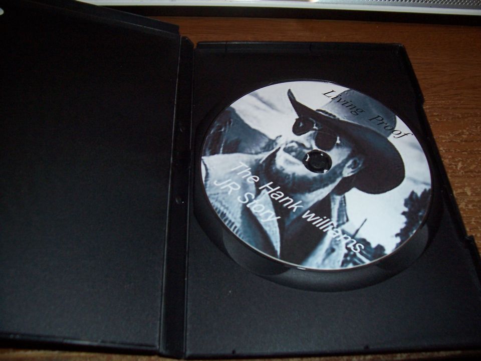 Open DVD case showing the Living Proof disc inside