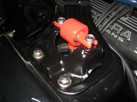 1968 Shelby GT500 - Close-up view of engine parts, with an orange component highlighted.