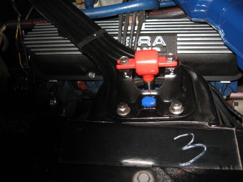 1968 Shelby GT500 - Engine bay component, possibly a shock mount, with 'MURA' visible on the engine cover.