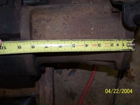 1979 Ford F-150 - A measuring tape is placed on a rusty metal component, with the date 04/22/2004 visible in the corner.