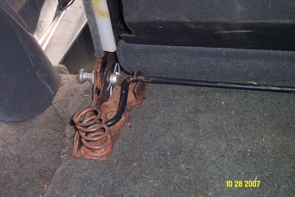 rusted seat adjustment mechanism with springs and lever