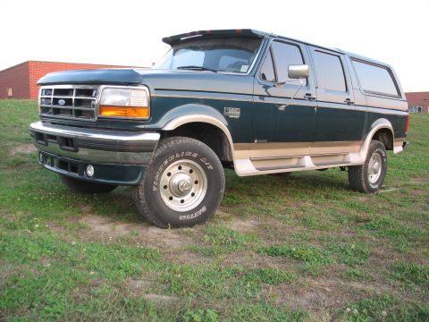 1995 Ford C-350 (Centurion Conversions) - This 1995 Ford C-350 Centurion Conversion van is shown in a three-quarter front view.