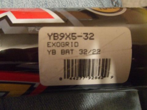 1987 Ford Bronco - A baseball bat is shown with a product label and barcode.