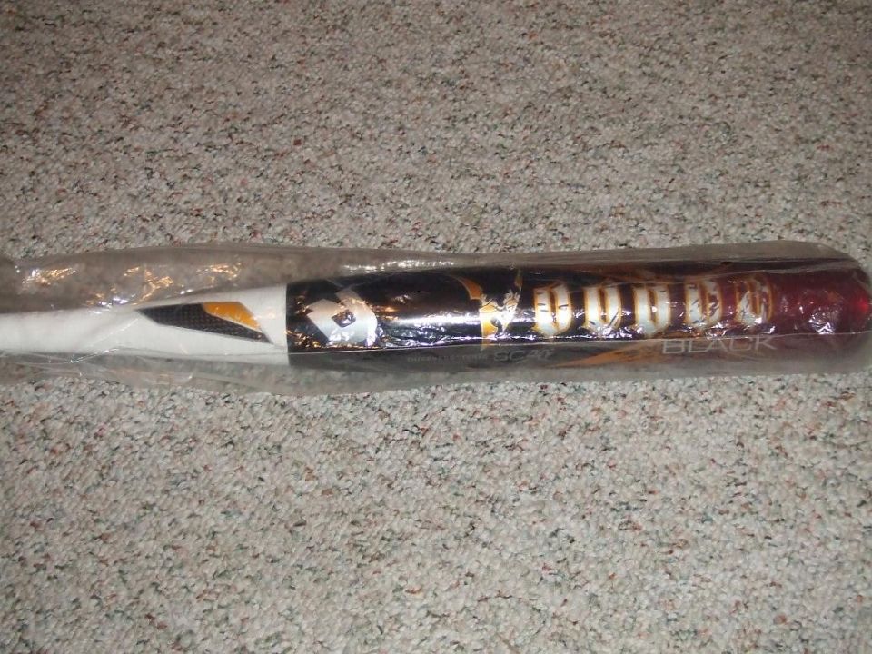 baseball bat with black and gold design