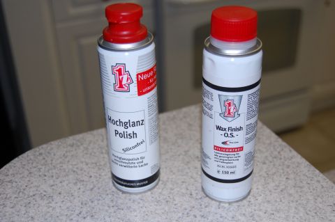 2002 BMW M3 - Two cans of car cleaning products sit on a speckled countertop.
