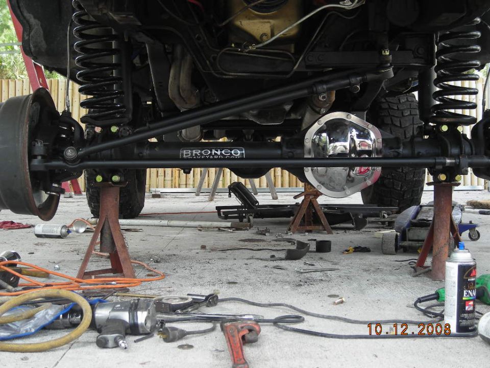 Undercarriage with "BRONCO" label on axle housing