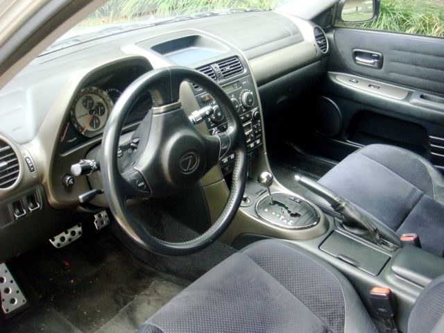 Lexus IS 300 interior with chronograph gauges, automatic shifter and aluminum pedals