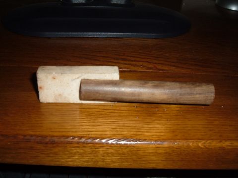 1998 BMW R1100GS ABS - A close-up view of a wooden tool with a handle and a block component.