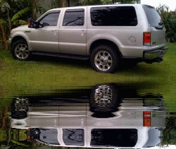2005 Ford Excursion - A silver 2005 Ford Excursion is shown from a 3/4 front angle, parked outdoors.