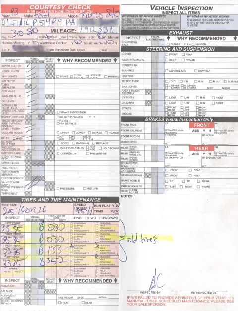 1993 Ford Taurus - A vehicle inspection document shows handwritten notes and tire maintenance details, with the year 1993 noted.