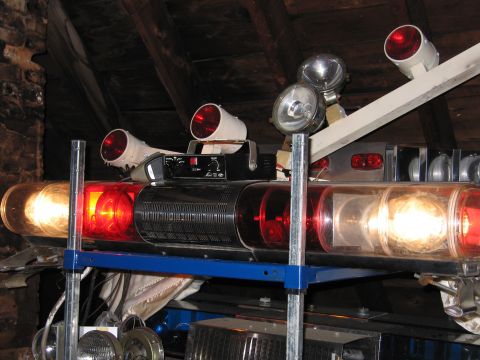 2001 Ford Crown Victoria - Emergency light bar with multiple lights and spotlights, possibly for a police or fire vehicle.