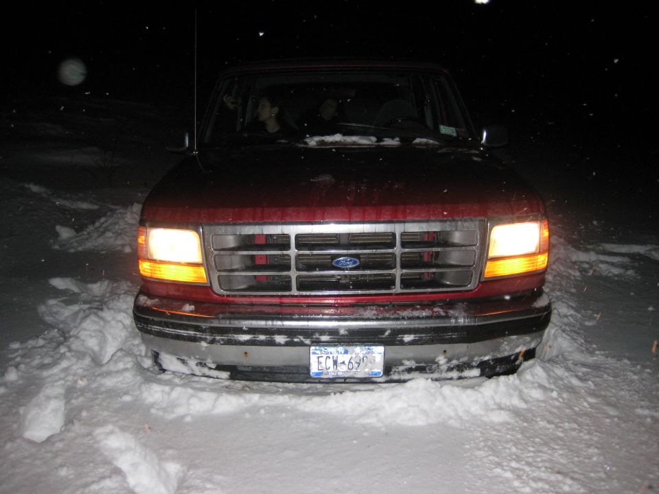 1994 Ford Bronco front view stuck in snow