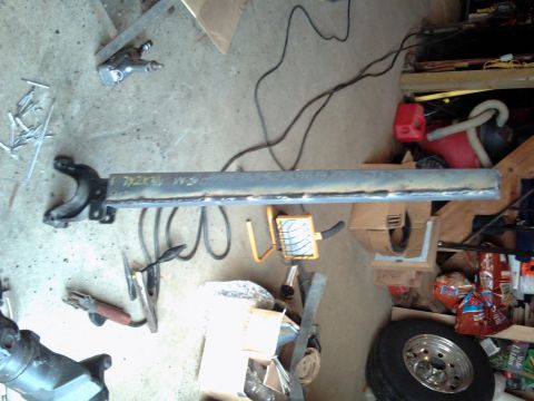 1996 Ford Bronco - A welded metal part, possibly a suspension component, is shown with handwritten markings.