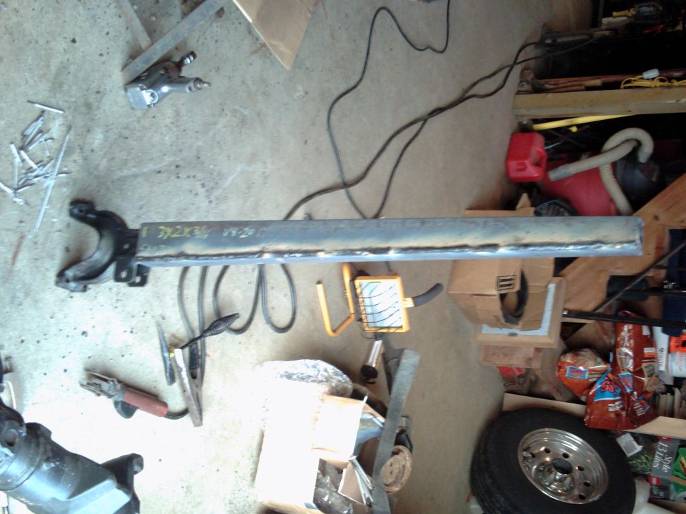 Welded metal part with writing "792X36 99-26"