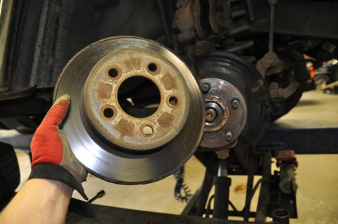 1996 Ford Bronco - Replacing a worn brake rotor on a vehicle's hub assembly.