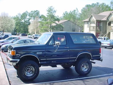 1989 Ford Bronco - This 1987 Ford Bronco is seen from the side in a parking lot.