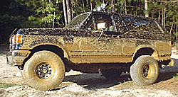 1989 Ford Bronco - 1989 Ford Bronco covered in mud after off-roading.