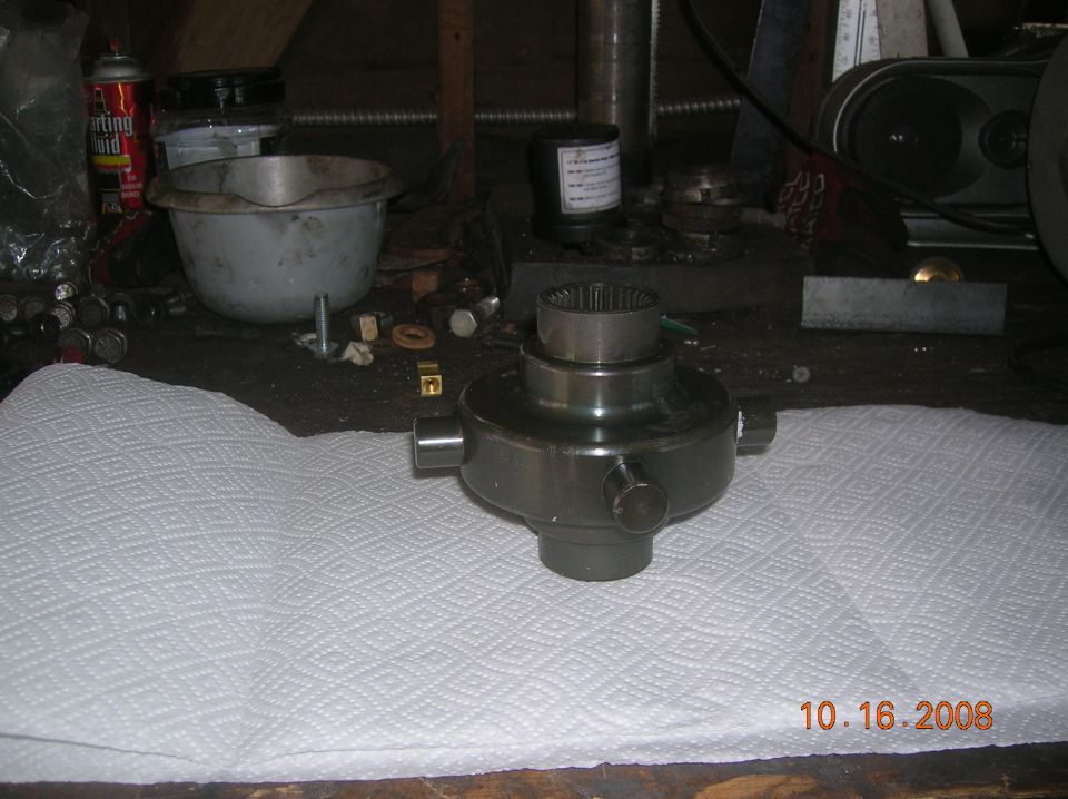 Disassembled differential center section on a workbench