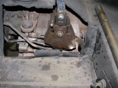 1976 Ford Bronco - This image shows the intricate mechanical linkage for a vehicle's manual transmission system.