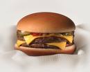 1996 Ford Bronco - A close-up view of a double cheeseburger, showing the layers of meat, cheese, and bun.