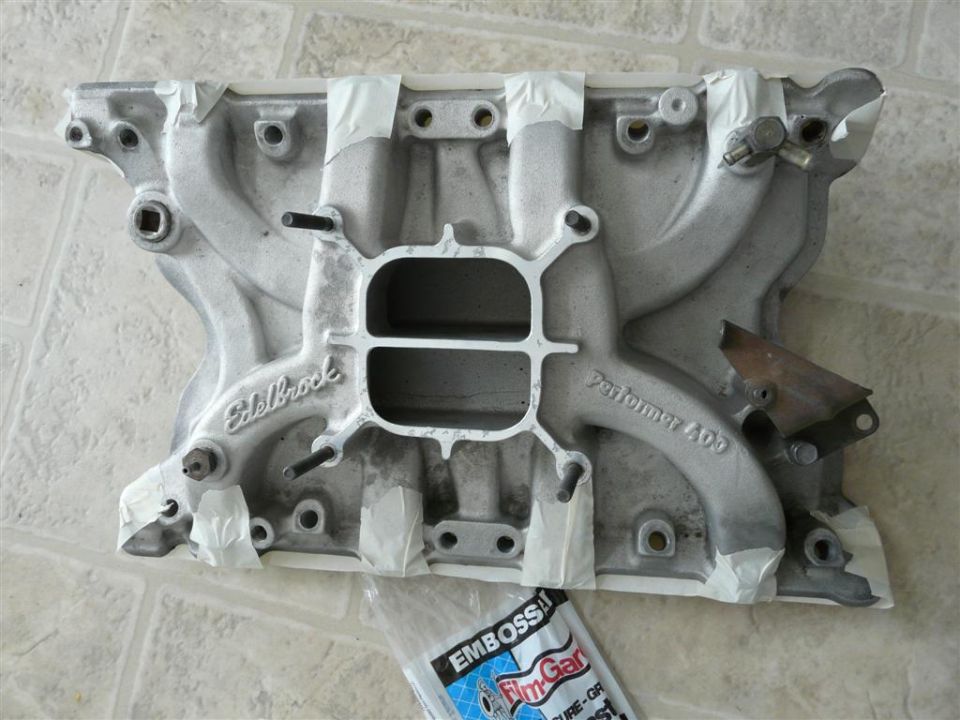 Edelbrock Performer 400 aluminum intake manifold on tile floor
