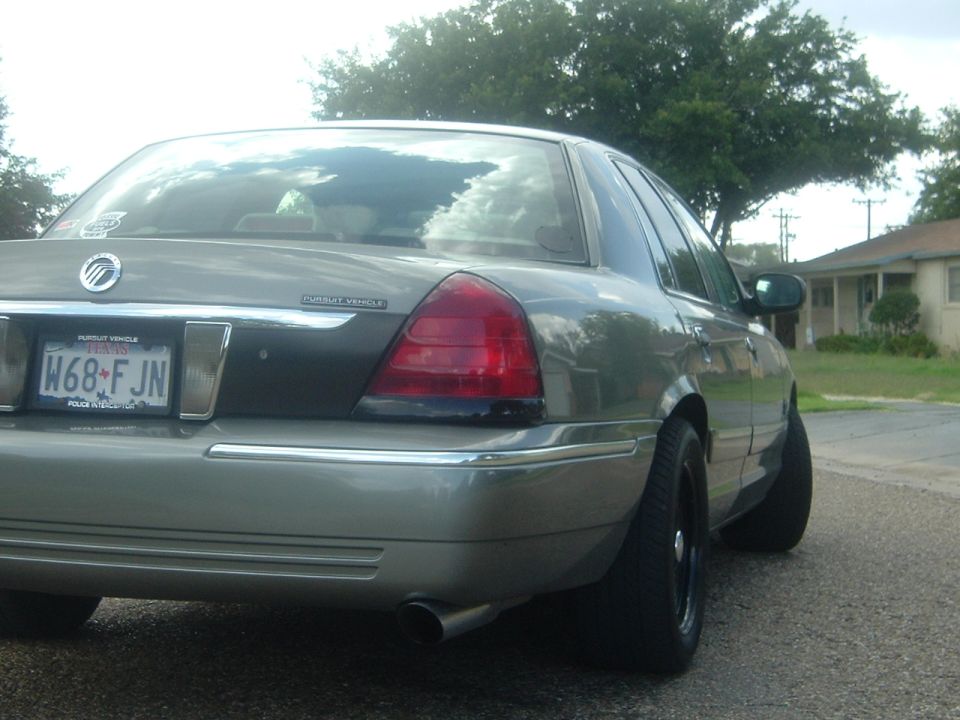 Gray 2003 Mercury Grand Marquis rear view