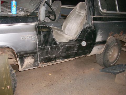 1988 Chevrolet Blazer - Driver's side of a 1988 Chevrolet Blazer, extensive custom metal repair on the door panel.