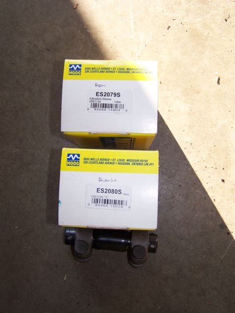 1986 Ford Bronco - Two Moog steering adjustment sleeve boxes are shown with the parts below.