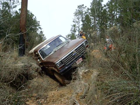 1985 Ford Bronco - not a good place for the weak..cost me two doors (popped dent out later) one left quarter..and fenders but its what I bought it for