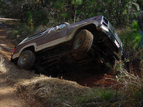 1985 Ford Bronco - Near roll...still made it...theres a drop off on the right rear tire. Tire slipped in and teetered over...just sheet metal ..right?