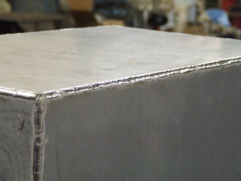 1967 Ford Bronco - A close-up view of a textured concrete surface, suggesting construction or an industrial setting.