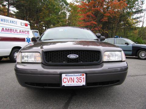 2001 Ford Crown Victoria - Front view of a 2001 Ford Crown Victoria, a Massachusetts license plate and an ambulance in the background.