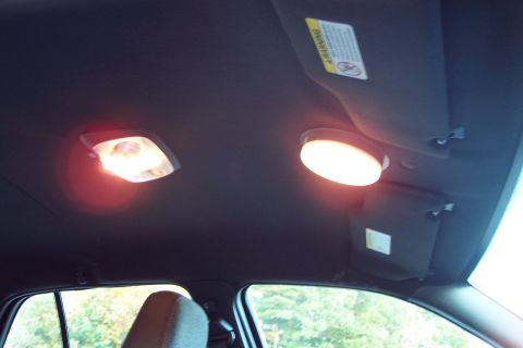 2001 Ford Crown Victoria - Interior shot showing the overhead lights and sun visors of a vehicle.