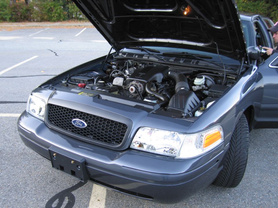 Photo of a Ford Crown Victoria front engine bay with hood open